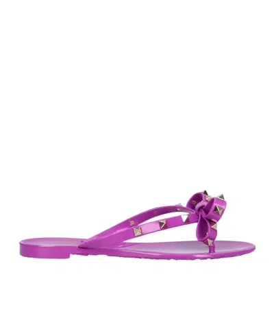 VALENTINO GARAVANI ROCKSTUD BOW-EMBELLISHED FLIP-FLOPS