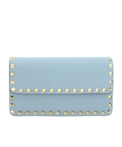 Valentino Garavani Rockstud Foldover Top Clutch Bag In Blue