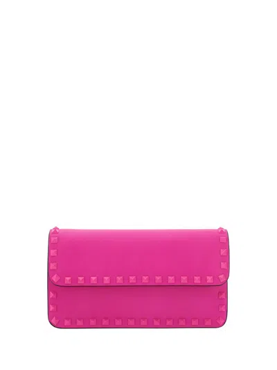 Valentino Garavani Rockstud Foldover Top Clutch Bag In Pink