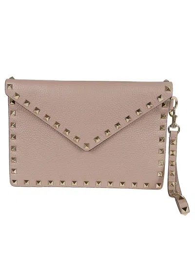 Valentino Garavani Rockstud Leather Clutch Bag In Pink