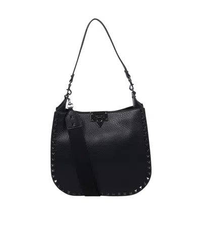 Valentino Garavani Rockstud Logo Printed Shoulder Bag In Black