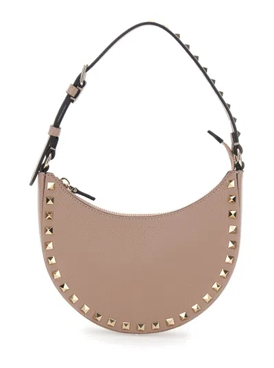 Valentino Garavani 'rockstud Mini' Pink Shoulder Bag With Applied Studs And Logo Printed On The Fron