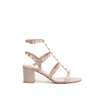 Valentino Garavani Block Heel Studded Leather Sandals In Pink
