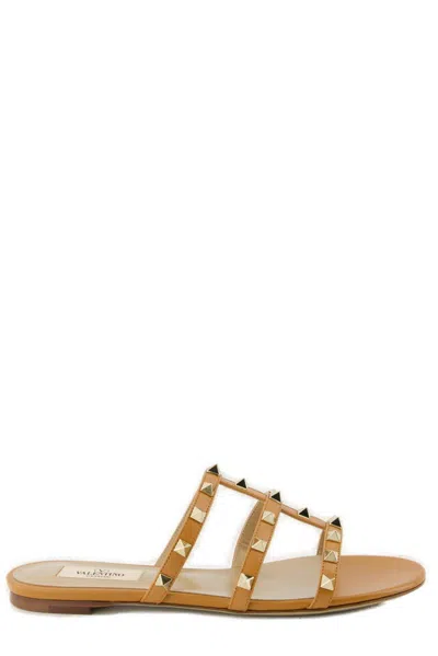 Valentino Garavani Garavani Rockstud Slip-on Flat Sandals In Brown