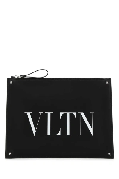 Valentino Garavani Rockstud Vltn Logo Printed Clutch Bag In Black