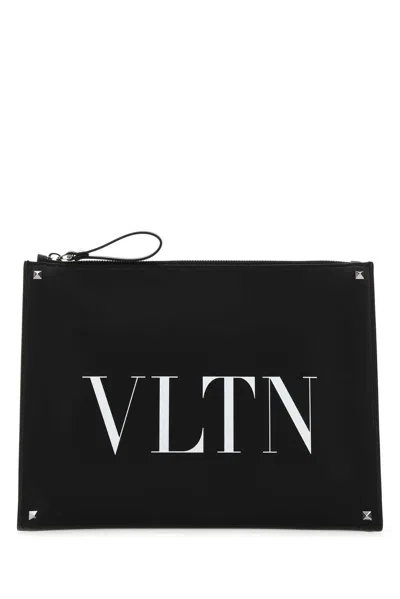 Valentino Garavani Rockstud Vltn Zip-up Clutch Bag In Black