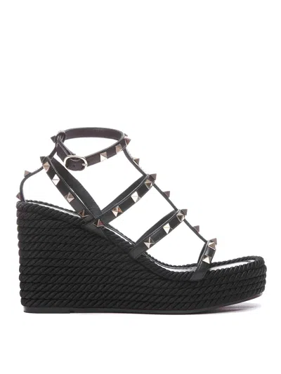 Valentino Garavani Rockstud Wedged Sandals In Black