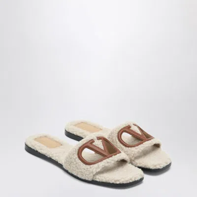 VALENTINO GARAVANI VALENTINO GARAVANI SANDALO SLIDE VLOGO CUT-OUT IN SHEARLING