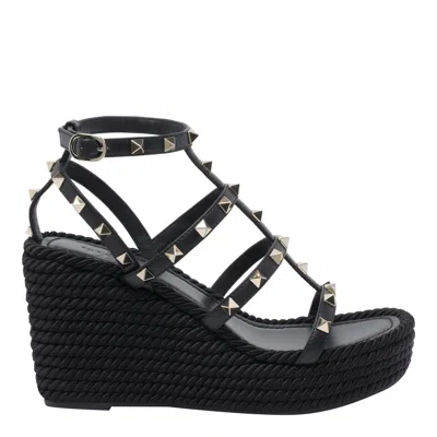 Valentino Garavani Rockstud Leather Wedge Sandals In Black