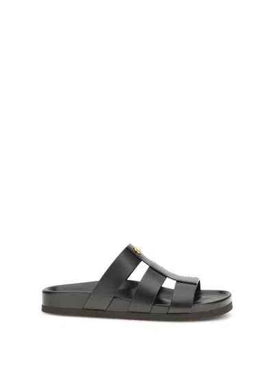 Valentino Garavani Studshield Logo-embellished Leather Sandals In Black