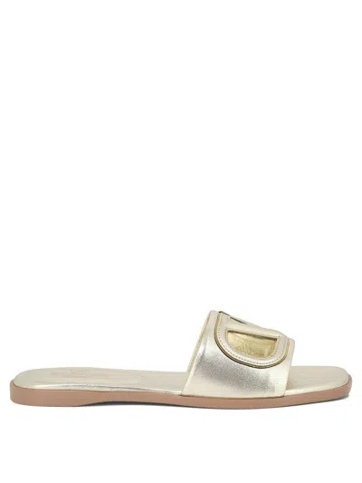 Valentino Garavani Gold Vlogo Cutout Laminated Nappa Leather Sandals In Platinum Antique Brass