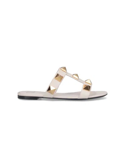 Valentino Garavani Roman Stud Flat Sandals With Signature Pyramid Studs In White