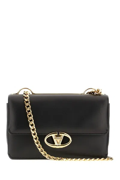 Valentino Garavani Shoulder Bags. In Black