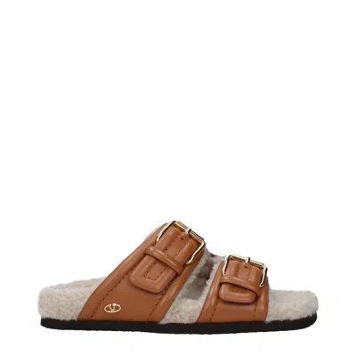 Valentino Garavani Slides And Clogs Women's Leather Brown/almond