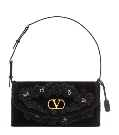 Valentino Garavani Small Embellished Devain Shoulder Bag In Black