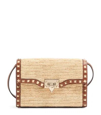 Valentino Garavani Small Leather-raffia Rockstud Shoulder Bag In Neutral