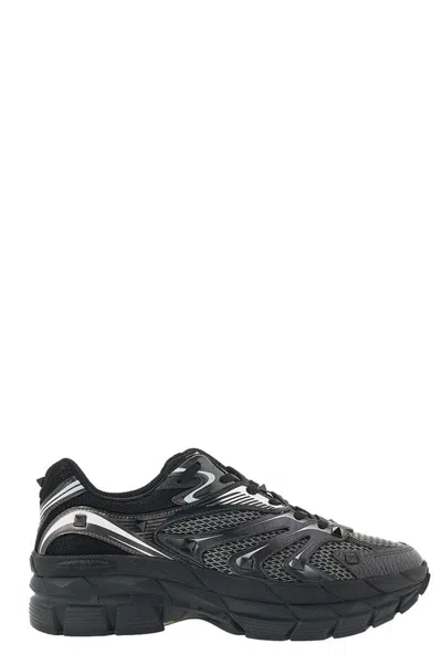 Valentino Garavani Sneakers & Slip-on In Black