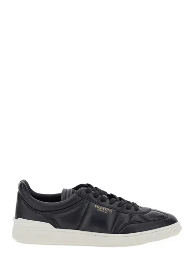 VALENTINO GARAVANI VALENTINO GARAVANI 'UPVILLAGE' BLACK LOW TOP SNEAKERS WITH SCREEN PRINTED LOGO IN LEATHER MAN