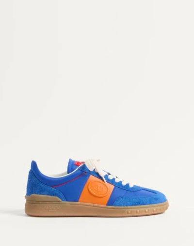 VALENTINO GARAVANI VALENTINO GARAVANI UPVILLAGE LOW TOP TRAINER IN CRUST LEATHER AND NYLON