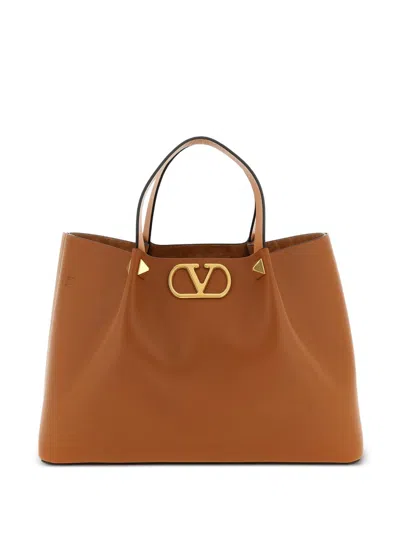 Valentino Garavani V Logo Signature Medium Leather Tote In Brown
