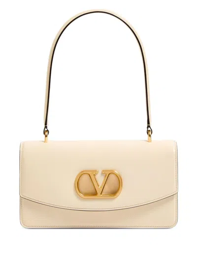 Valentino Garavani Vain Leather Top Handle Bag In White