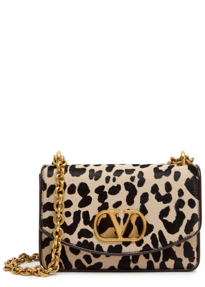 Valentino Garavani Vain Small Cow-print Leather And Calf-hair Shoulder Bag In Brown
