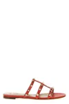 Valentino Rockstud Flat Sole Open Toe Sandals In Red