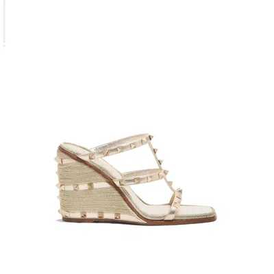Valentino Garavani Rockstud Wedge Mules In Gold