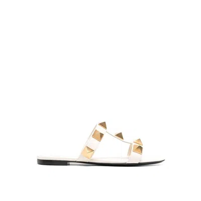Valentino Garavani Roman Stud Flat Sandals With Signature Pyramid Studs In White