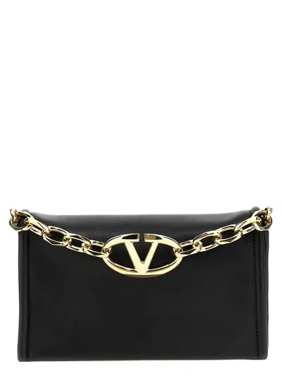Valentino Garavani 'vlogo Chain' Clutch Bag In Black