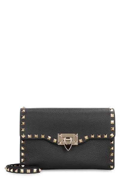 Valentino Garavani Valentino Rockstud Grainy Calfskin Crossbody Bag For Woman In Black