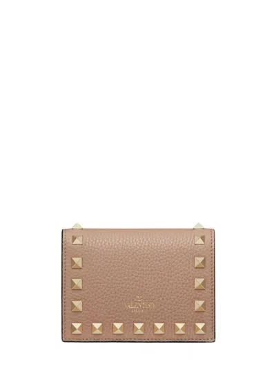 Valentino Garavani Valentino Rockstud Small Wallet With Gold-tone Stud Details And Snap Closure In Pink
