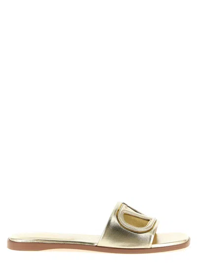 Valentino Garavani Vlogo Laminated Calfskin Slide In Gold