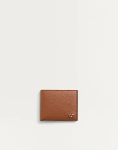Valentino Garavani Vlogo Signature Grainy Calfskin Wallet In Brown