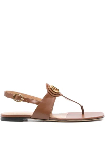 Valentino Garavani Vlogo Signature Leather Thong Sandals In Brown