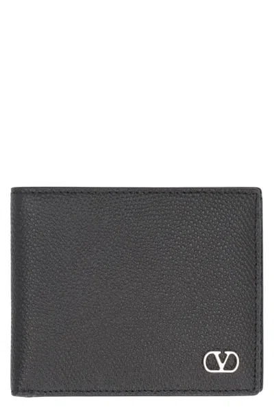 Valentino Garavani Textured Leather Wallet With Subtle Logo Detail In Black