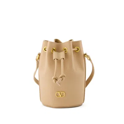 Valentino Garavani Vlogo Signature Mini Leather Bucket Bag In Nude