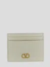 Valentino Garavani Textured Leather Wallet With Logo Embellishment