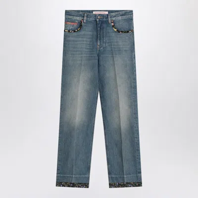 VALENTINO VALENTINO GARAVANI WASHED JEANS WITH FLORAL TRIMS