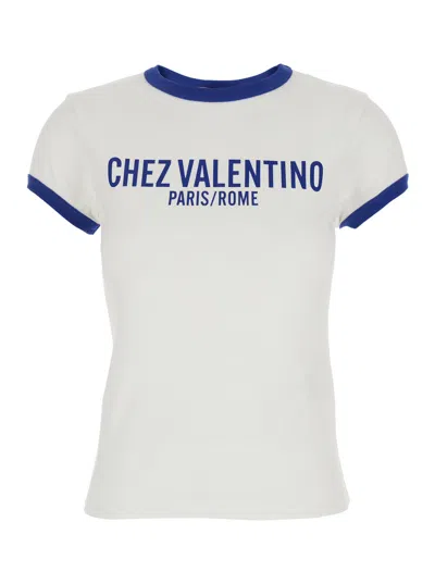 VALENTINO VALENTINO GARAVANI WHITE T-SHIRT WITH CHEZ VALENTINO PRINT ON THE FRONT IN COTTON WOMAN