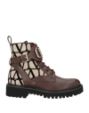 Valentino Logo-embossed Leather Combat Boots In Brown