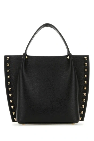 Valentino Garavani Woman Black Leather Rockstud Handbag In Animal Print