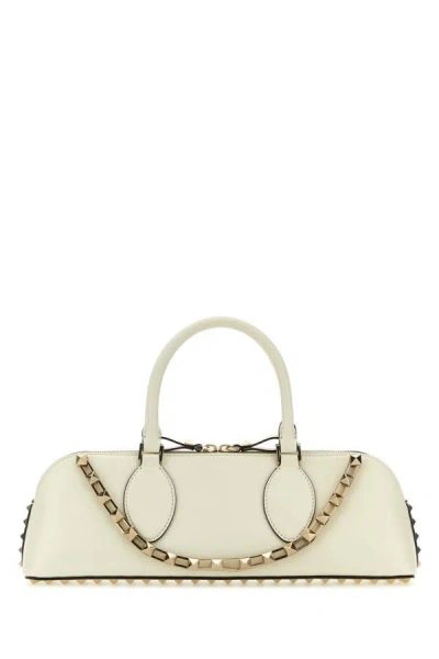 VALENTINO GARAVANI VALENTINO GARAVANI WOMAN IVORY LEATHER ROCKSTUD EAST-WEST HANDBAG