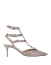 Valentino Garavani Rockstud Patent Leather Slingback Pumps In Beige