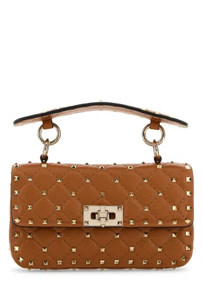 Valentino Garavani Women Caramel Nappa Leather Small Rockstud Spike Handbag In Brown
