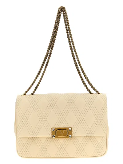 Valentino Garavani M Shoulder Bag In Yellow