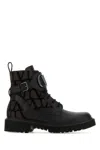 Valentino Garavani Women Two-tone Leather And Toile Iconographe Logo Combat Ankle Boots In Multi