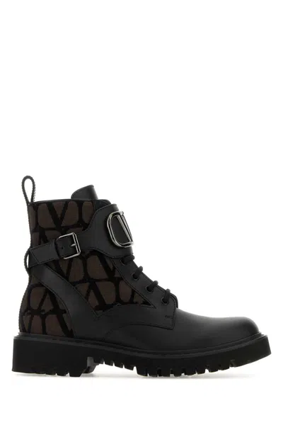 Valentino Garavani Women Two-tone Leather And Toile Iconographe Logo Combat Ankle Boots In Multi