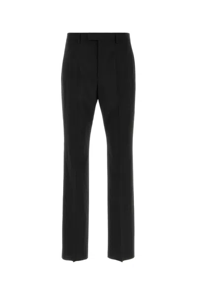 Valentino Garavani Wool-blend Animal Print Trousers For Men In Black