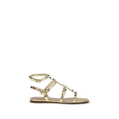 Valentino Garavani Gold Calf Leather Bos Taurus Flat Sandals In Animal Print
